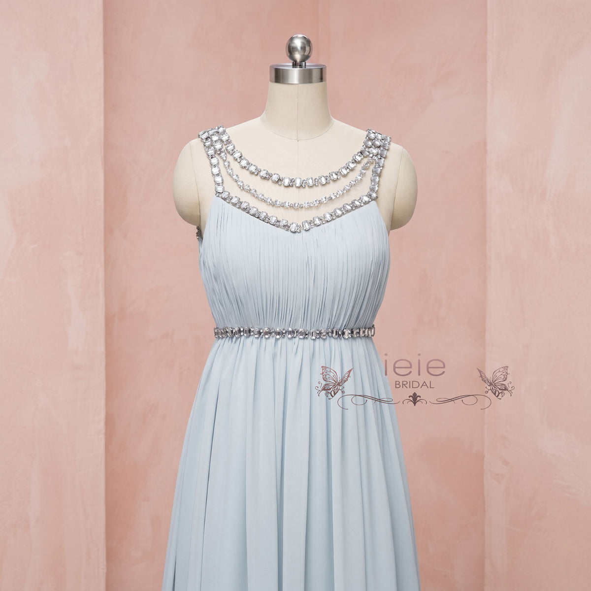 Close-up view of the intricate crystal and rhinestone embellished bodice on the ieie Bridal Grecian Goddess chiffon wedding gown.