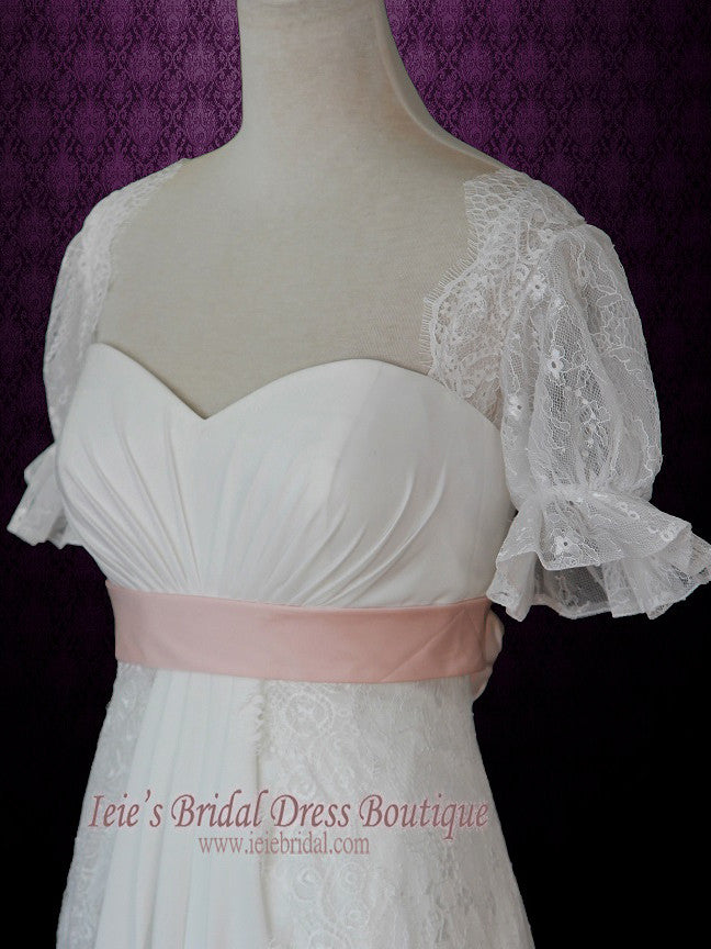 Empire Lace Wedding Dress with Sleeves Pink Sash and Flowers ANTJE ieie Empire Lace Wedding Dress with Sleeves Pink Sash and Flowers ANTJE ieie